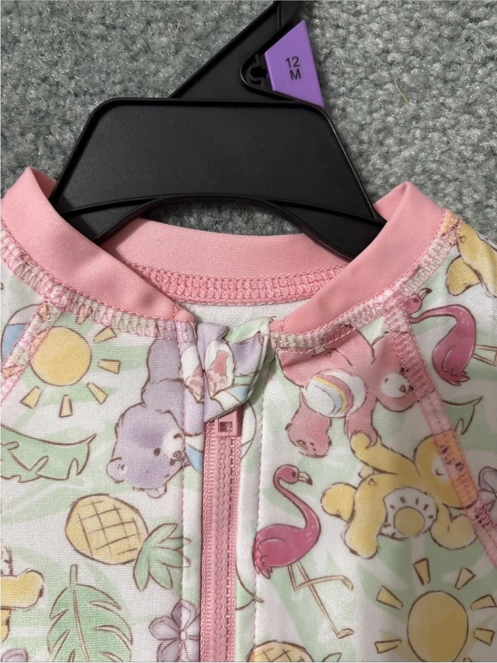 Care Bears Pastel Multicolor Pink-Trim UPF 50+ Baby Swim Romper One Piece NWT